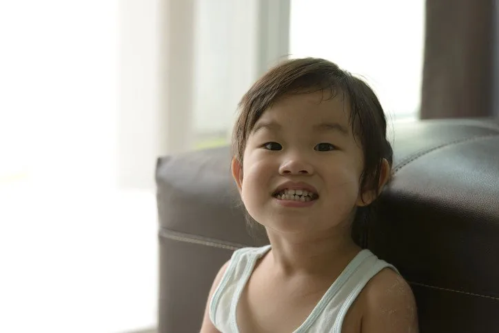 Toddler having their teeth brushed