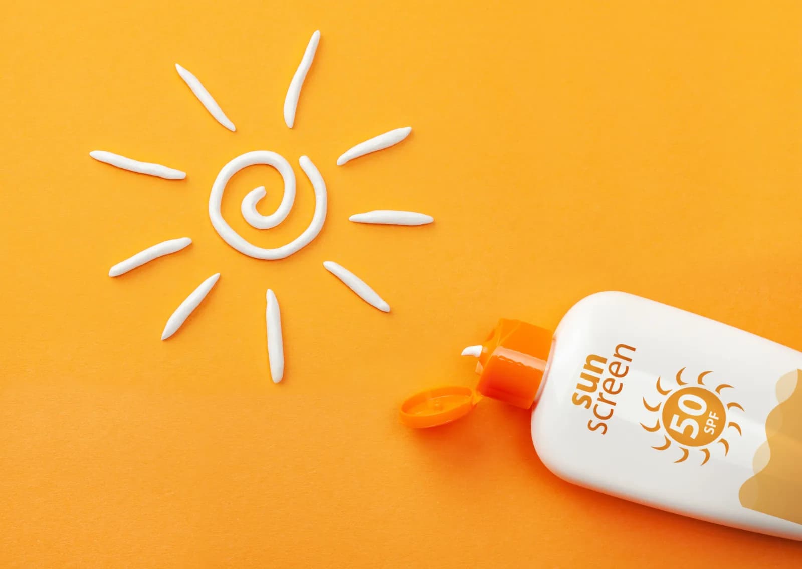 Botol sunscreen dengan gambar matahari