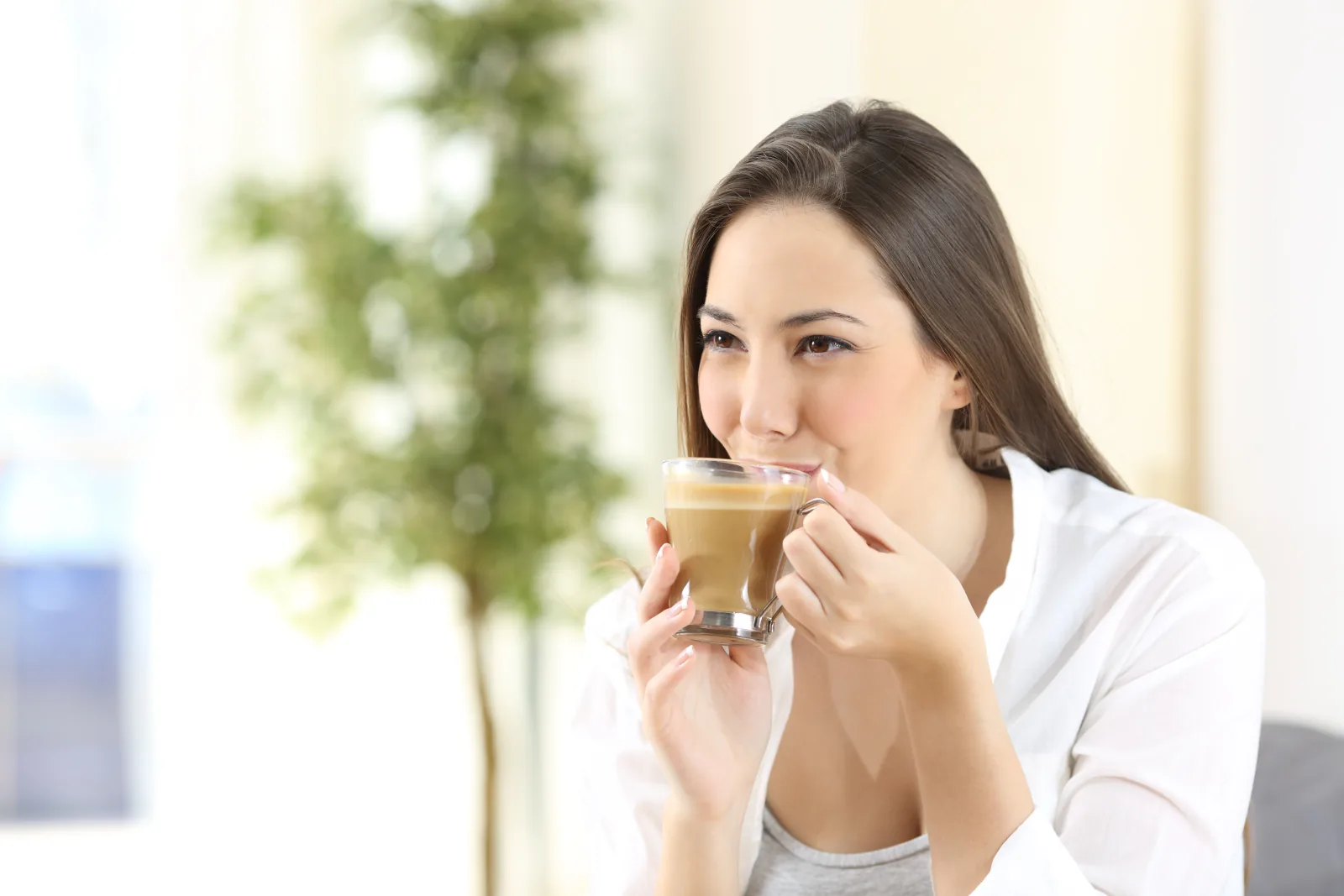 Woman drinking a warm drink